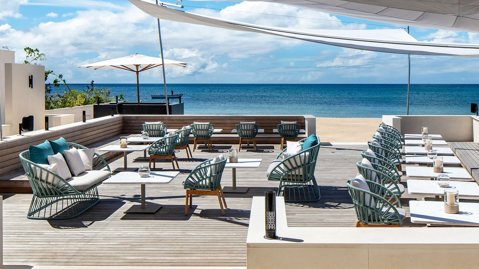 Outdoor commercial hospitality dining table and chair set by the sea