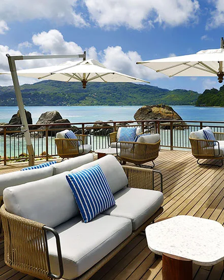Outdoor & resort furniture featuring weather-resistant wicker seating & cushions