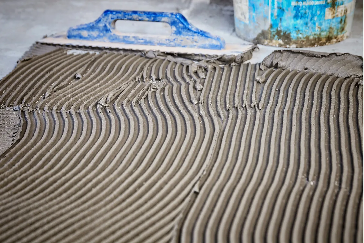 tile-adhesive-applied-to-surface