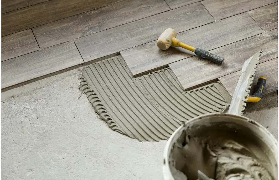 construction-site-with-cement-adhesive-and-tools